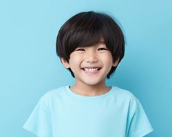 Smiling child in blue t-shirt