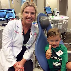 Birmingham Dentist, Dr. Rohner with patient doing thumbs up