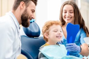 Happy child in dentist’s chair